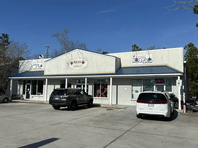 Small commercial building with new metal roof
