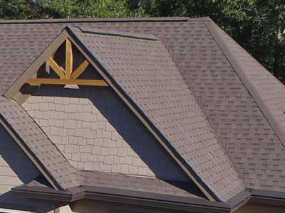 Close up of a residential roof with brown Atlas shingles