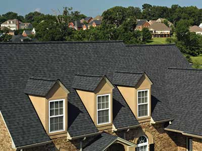 Close up of a large residential roof with black CertainTeed shingles