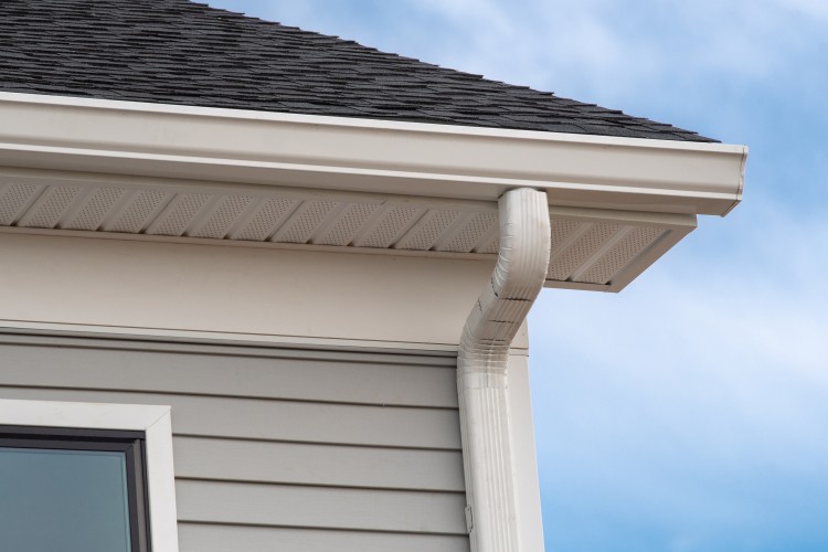 Seamless aluminum gutters and leaf guard protection installed on a home in Oklahoma